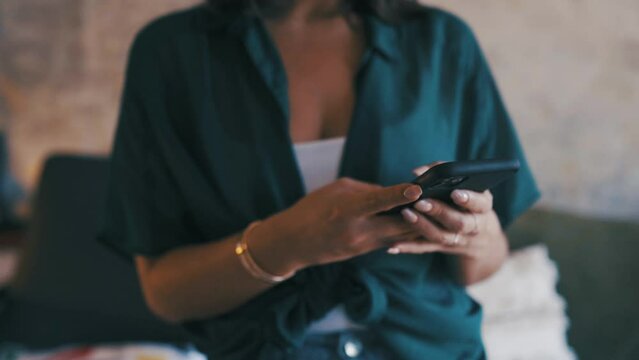 Hands, cellphone and typing online or home connection, social media or communication. Person, fingers and digital device or browse chat or texting for internet conversation or email, scroll or search