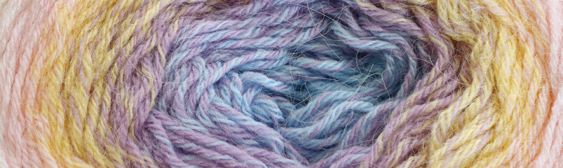 Obraz premium colorful pastel warm and cozy yarn ball of wool