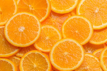 oranges cut into slices and laid out on the table as a food background 5
