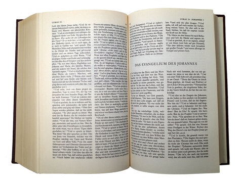 An old used German bible. It's opened at the Gospel of John. Transparent background. - Powered by Adobe
