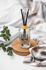 Aromatic reed air freshener, eucalyptus leaves and candle