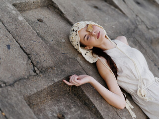 Beauty in Nature: A Young Caucasian Woman, Model of Fashion and Lifestyle, Enjoying Summer Vacation on a Beach