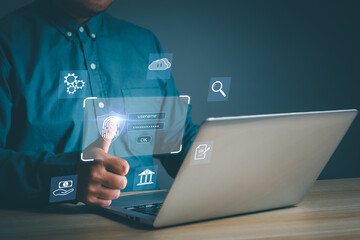 Concept Cyber ​​security internet protection personal information. businessman fingerprint scanner Username and password for safety data on laptop and virtual interface lock.