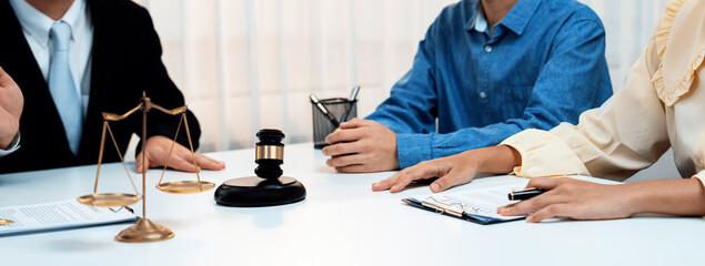 Lawyer acting as mediator broke a compromise between two parties to resolve business dispute through negotiation at law firm office. Legal mediation and conflict resolution service. Panorama Rigid - obrazy, fototapety, plakaty