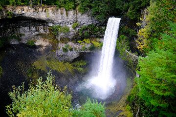 A captivating view of Brandywine Falls near Whistler, BC, Canada. Nature's symphony, as water cascades down rocky cliffs in a picturesque display.