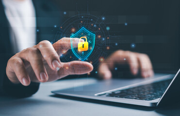 Cyber ​​security concept, data protection with secure online access and data privacy protection,Cyber security network,user taps protection icon with padlock with virtual graphics on computer