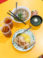 Vietnamese Chicken Rice or Com Ga Hoi An, Pho Bo and iced tea is signature dishes from Vietnam, usually served with scallion, onion and cilantro (coriander leaves), bean sprouts, lime, chili oil