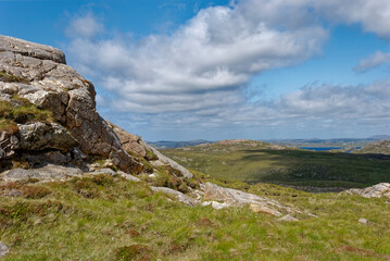 The view across the interior of the Isle of Lewis in the Hebrides from a Granite Crag looking North towards the Sea.