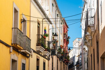 Balconies in picturesque-facaded houses in the old town of Caceres, Spain