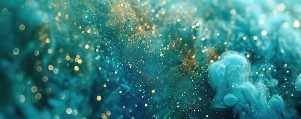 Poster Abstract smoke background in blue green colors and gold particles with highlights and blurs for design. © Evgeniia