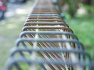 close up photo with selective focus of a fence made from iron rod