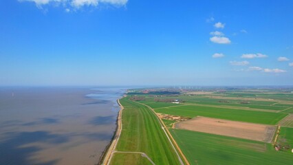 Wurster North Sea Coast - Wremen - Northern Germany - the dike and the dike foreland in the mudflats