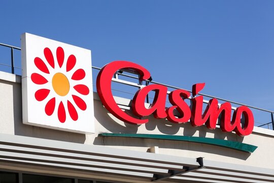 Lyon, France - May 21, 2020: Casino supermarket logo on a wall. Casino is a hypermarket and supermarket chain based in Saint Etienne, France