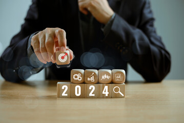 Start calendar 2024 plan concept. Businessman setup objective plan action target, business trend...