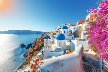 Santorini, Greece. Amazing view of Santorini island, Cyclades, Greece. Whitewashed houses with blue domed churches on a cliffside overlooking the Aegean Sea. - obrazy, fototapety, plakaty