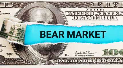 Bear Market. The word Bear Market in the background of the US dollar. Investment Decline, Pessimism, and Negative Market Sentiment Concept.