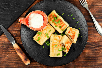 Pancakes stuffed with chicken liver.