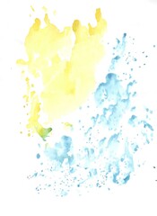 Yellow and blue watercolor paint stains on white papper 