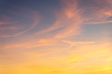 Blue-orange sunset on the cloudy sky. Nature texture.