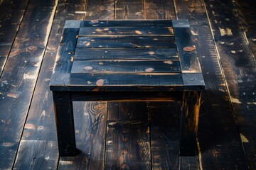 Black wooden table on the dark wooden floor