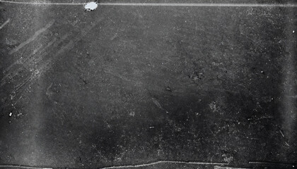 Dusty scratched and scanned old film texture for banner on black asphalt