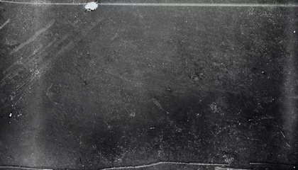 Fototapeten Dusty scratched and scanned old film texture for banner on black asphalt © Uuganbayar