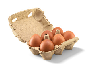 Open carton with six brown chicken eggs isolated. Transparent PNG image.