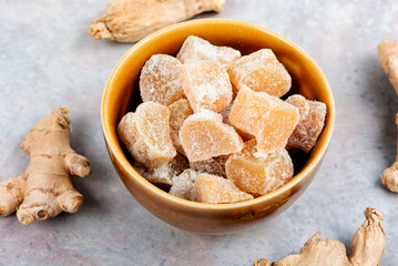 Ginger candies and fresh ginger.