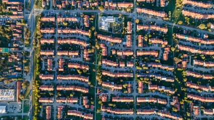 Aerial view of suburban houses in new modern development area. Small city on aerial view. Scenic seasonal landscape from above aerial view of a small town in countryside Pancevo, Serbia