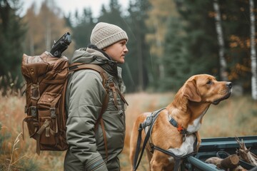 A lone adventurer, accompanied by his trusty brown hunting dog, sets off on a journey through the rugged wilderness, their backpack and loyal companion always by their side