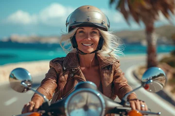 Foto auf Acrylglas Happy and stylish Caucasian woman sitting on a motorcycle, embodying freedom, adventure © Andrii Zastrozhnov