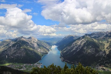 Fototapeta na wymiar Achensee view mountains and sky lake
