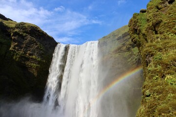 iceland waterfall great big green rainbow