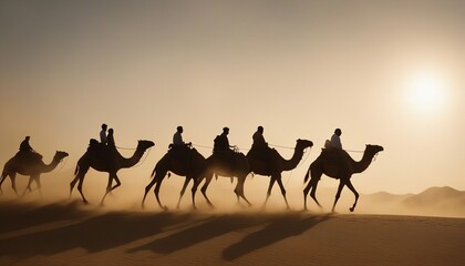 side view of silhouettes of camels and their owners moving in single file in a sandstorm in the desert
