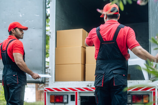 Professional Movers Checking Inventory for Move.