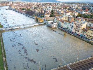 Aerial view of Pisa and the Arno river during a flood, Tuscany, Italy