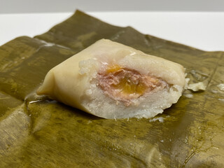 Nagasari or nogosari, traditional pudding with banana slice inside, wrapped in banana leaves. Snack from Indonesia