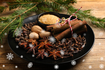 Different spices and fir tree branches on wooden table. Cinnamon, anise, cloves, allspice, nutmegs,...