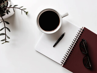 Obraz na płótnie Canvas cup of coffee and notebook