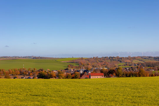 Colorful Autumn landscape of hilly countryside in Zuid-Limburg, Small houses on hillside with sunlight in morning, Partij is a village in southern part of the Dutch province of Limburg, Netherlands.