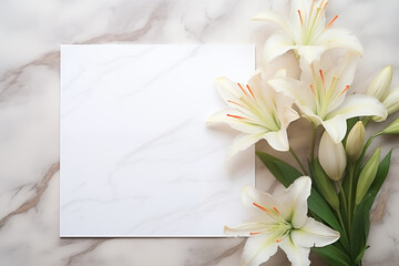 Blank floral mockup of white sheet of paper with lily flowers for wedding, birthday invitation or save date card with copy space, top view.