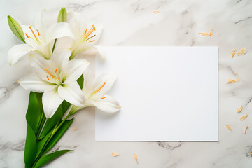Blank floral mockup of white sheet of paper with lily flowers for wedding, birthday invitation or save date card with copy space, top view.