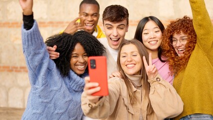 Diverse teenager people taking a selfie celebrating something very happy