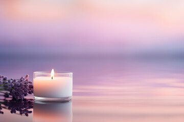 Obraz na płótnie Canvas Burning candle with lavender flowers in water on violet background