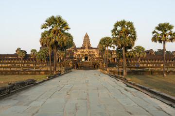 Entrance to the historic Angkor Wat temple complex at dawn