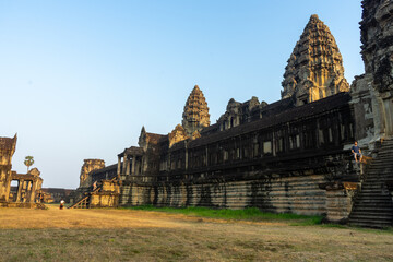 The ancient grandeur of Angkor Wat temple at sunset