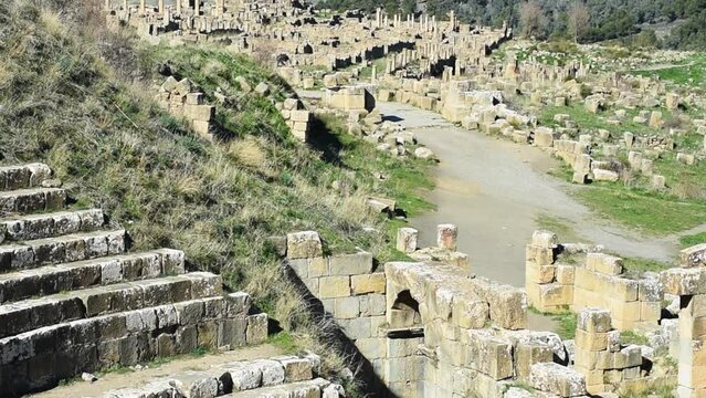 High-angle footage of the theatre of the ancient Roman town of Djemila. Setif, Algeria. UNESCO World Heritage Site.
