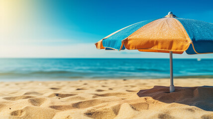 Fototapeta na wymiar A colorful cocktail on a beach towel radiates carefree summer vibes under the golden sun.