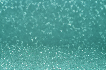 Valentine day concept idea. Abstract turquoise background. Heart. Bokeh.