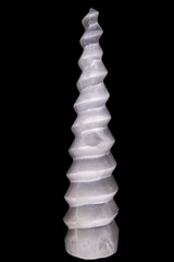 Closeup shot of Raw Tower of Selenite Crystal on black background